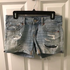 Distressed denim shorts
